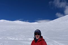 12B Jerome Enjoying A Rest Day At Mount Vinson High Camp With The Start Of The Route To the Summit Behind.jpg